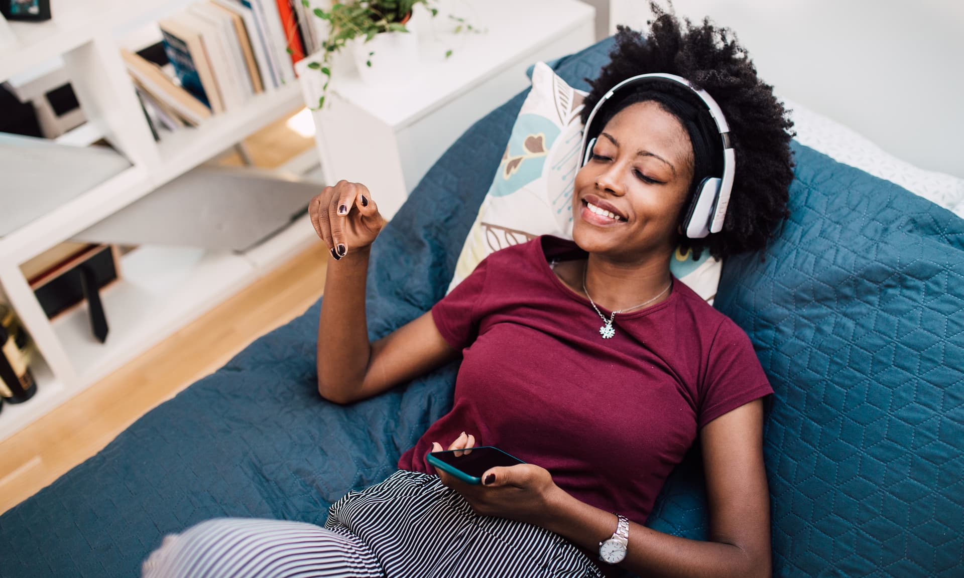 woman listening to headphones