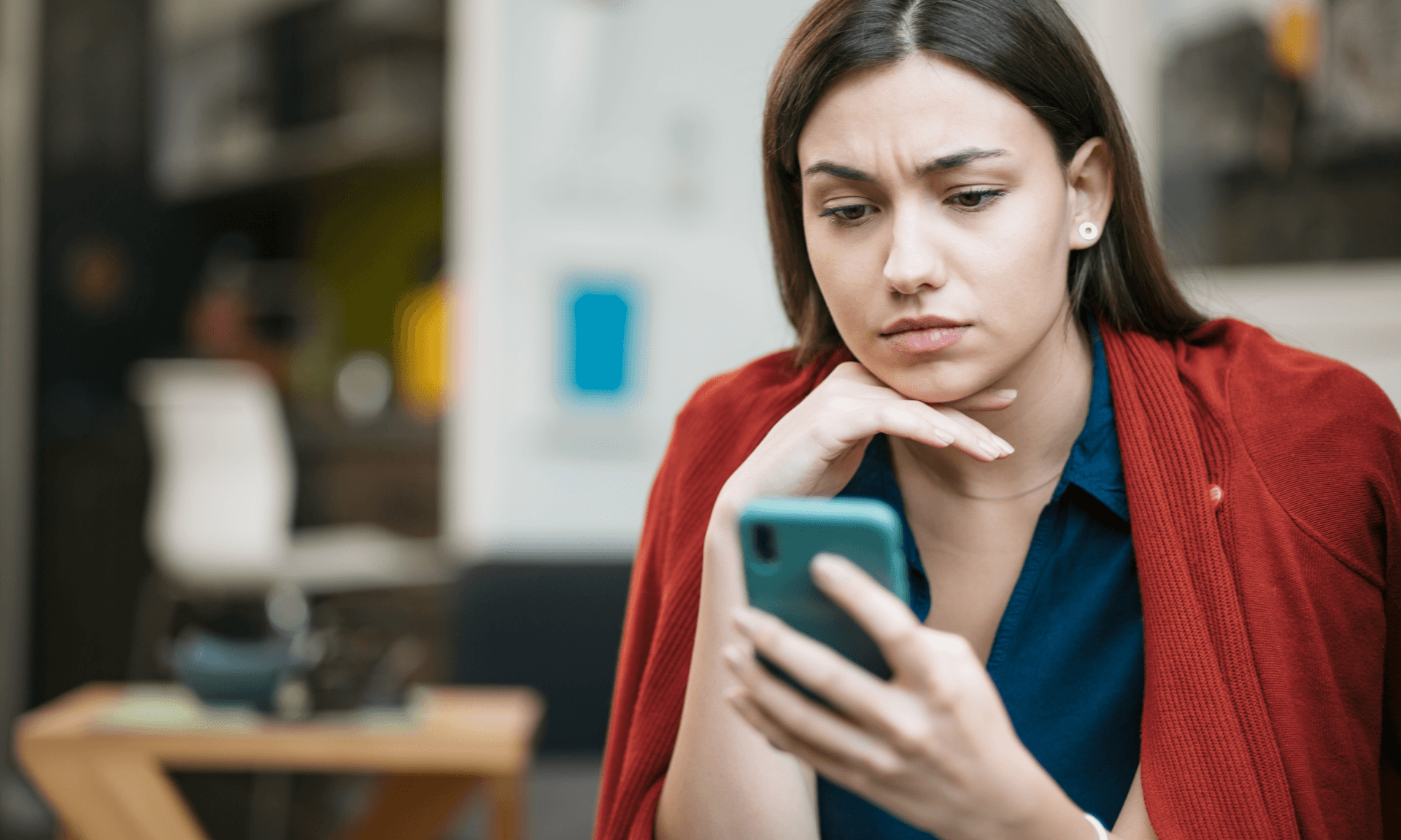 Woman staring at phone
