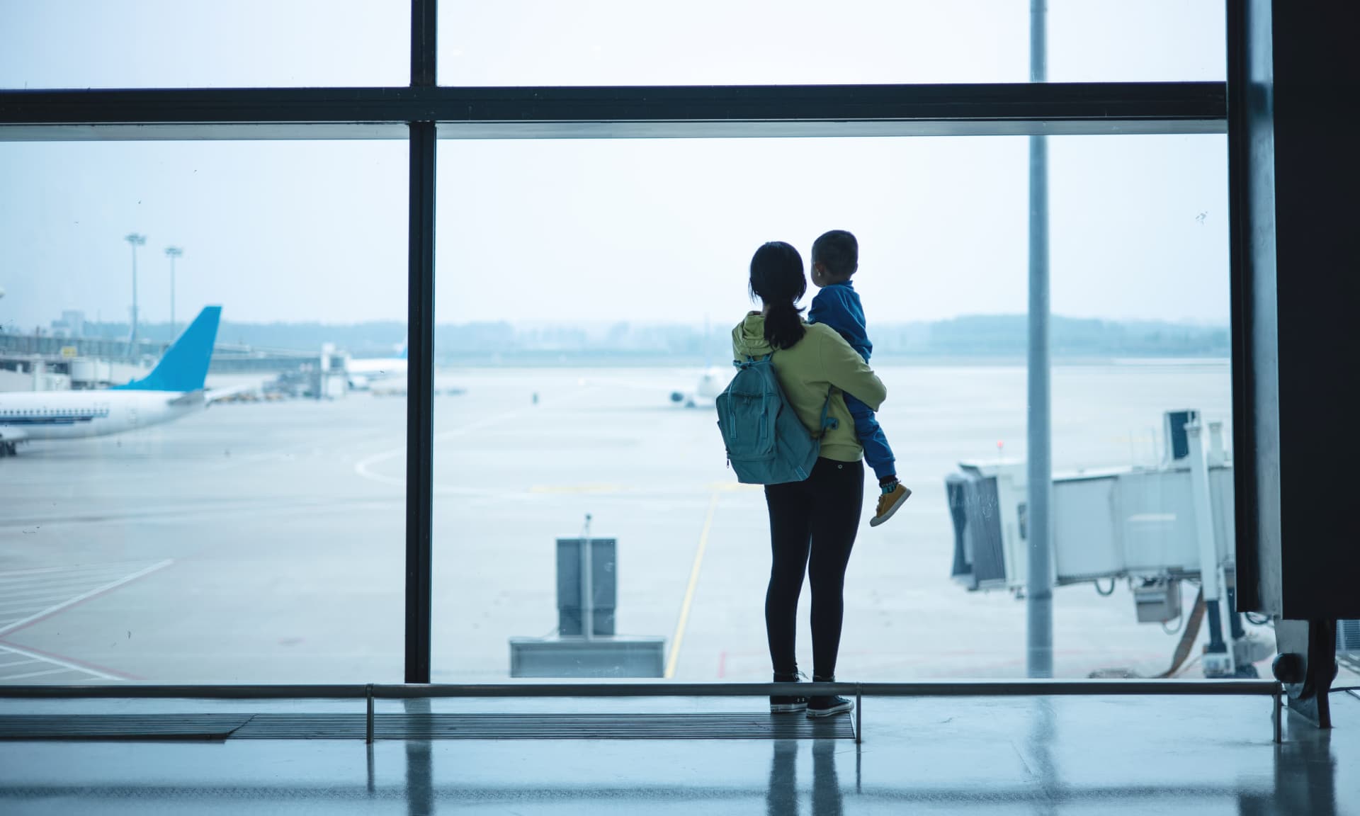 Mother and child at the airport