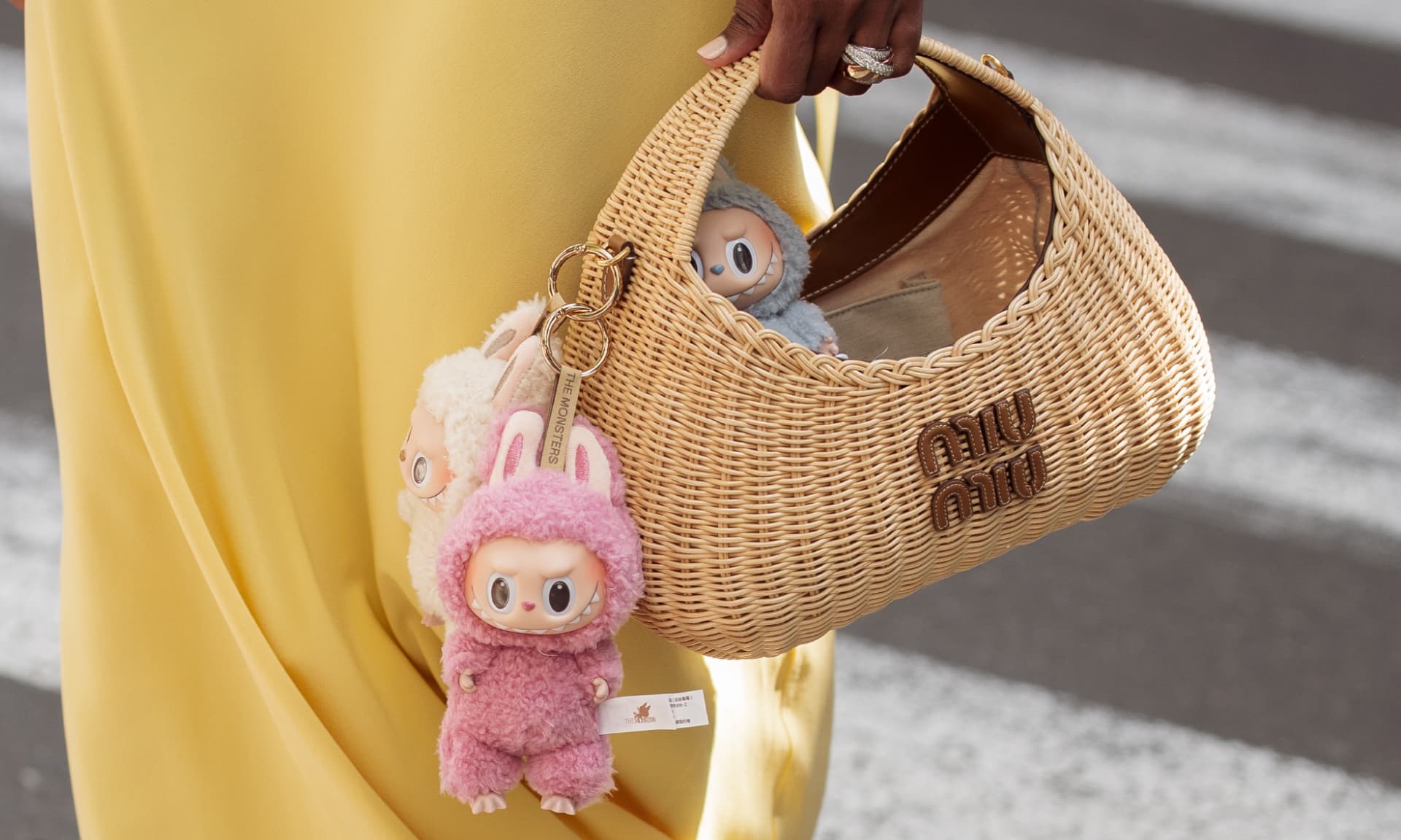 Purse with Labubus attached