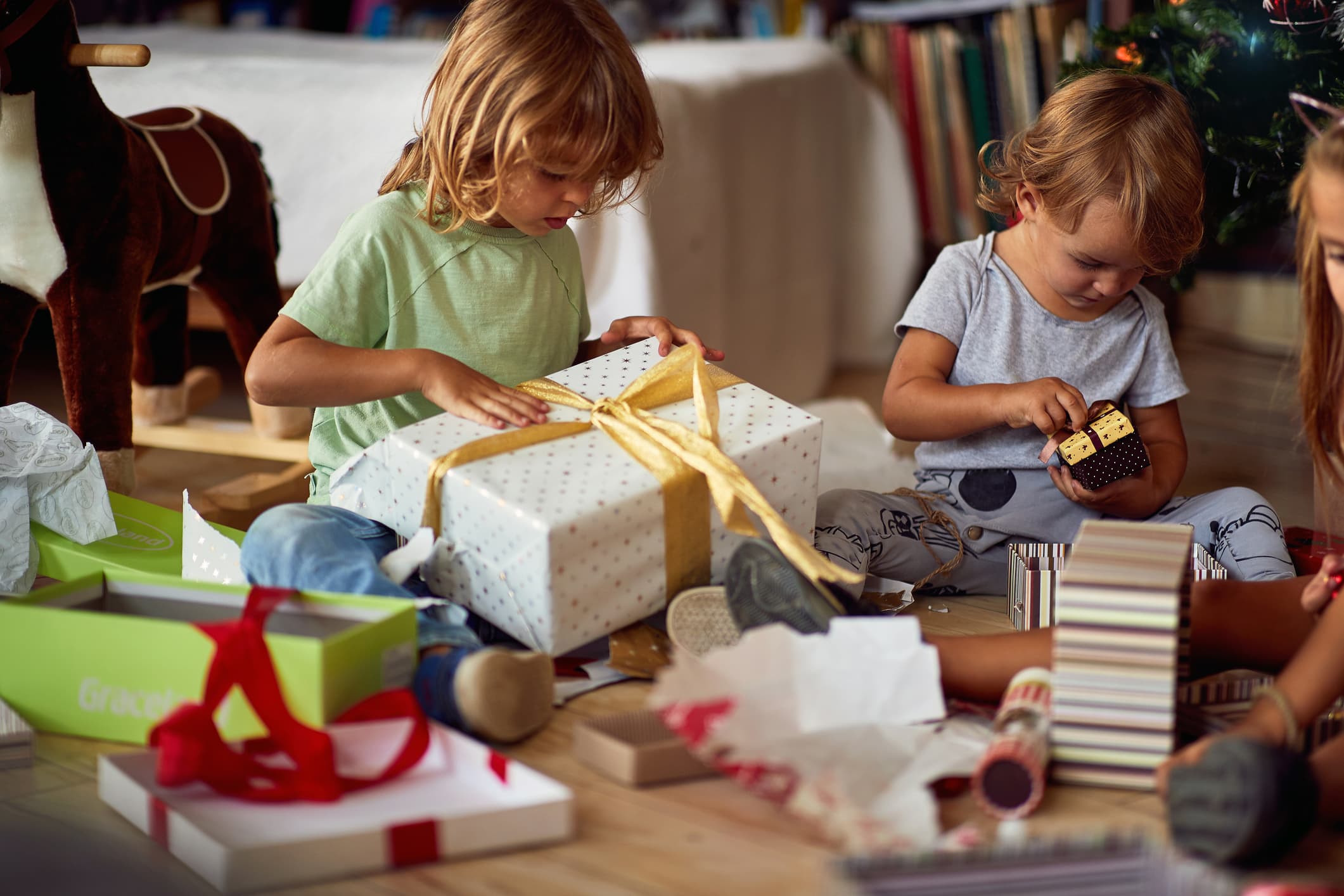 children opening gifts
