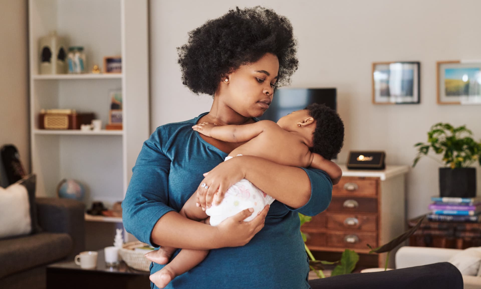 mom holding baby in her arms